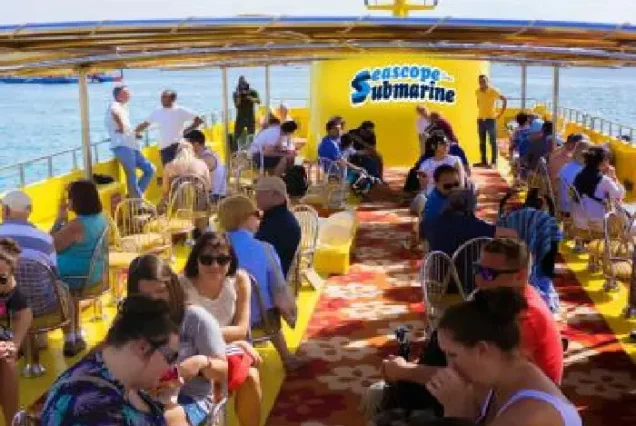 Comfortable seating area inside the Sea Scope underwater gallery.