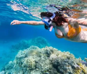 Snorkeling stop at vibrant coral reefs during Hurghada sea scope trip.