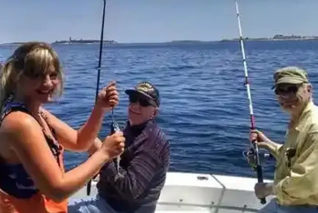 Group of friends enjoying deep sea fishing adventure in Hurghada