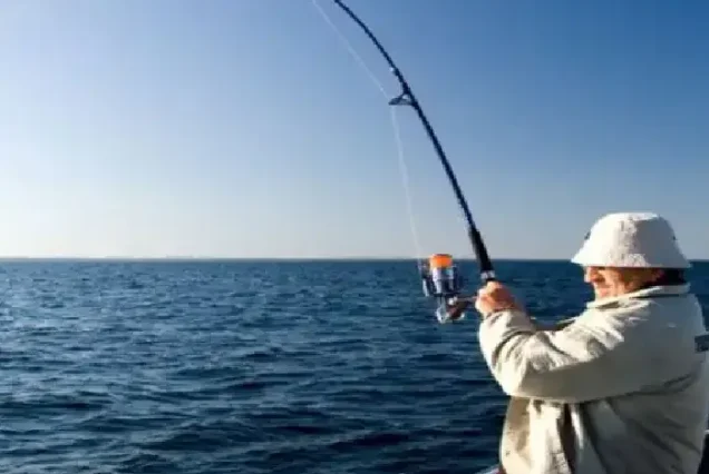 Private chef preparing fresh catch on a fishing boat in Egypt