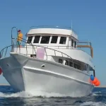 Manolo Tours boat heading to the Dolphin House in Hurghada.