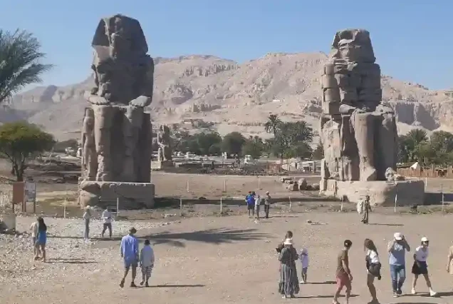 Giant stone statues known as the Colossi of Memnon.