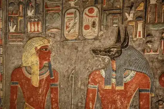 Alt Text: Intricate hieroglyphic carvings on Luxor Temple walls