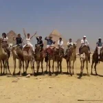 Camel riding in front of the pyramids is an optional activity within the Cairo tour.