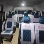 Comfortable seats inside the Manolo Tours VIP minibus.