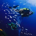 Tourists having their first scuba diving experience in Egypt.