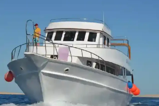 Spacious diving boat sundeck for relaxation between dives.
