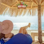 Manolo Tours travelers enjoying Hula Hula Island white sand beach.