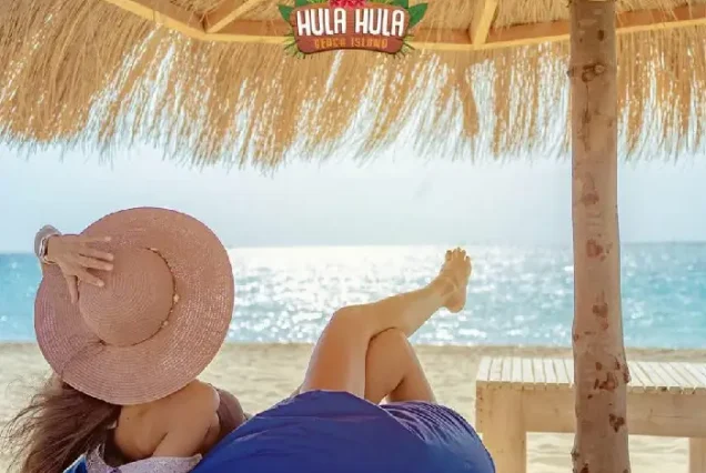 Manolo Tours travelers enjoying Hula Hula Island white sand beach.