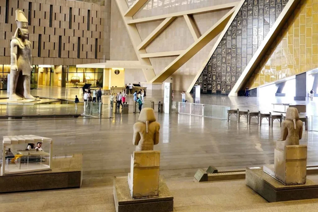 Modern museum interior with ancient artifacts.