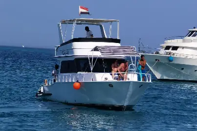 Premium luxury private boat sailing in the deep blue Red Sea waters,